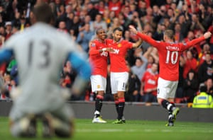 Ashley Young, Ryan Giggs and Wayne Rooney enjoy Manchester United’s 8-2 win over Arsenal in 2011.