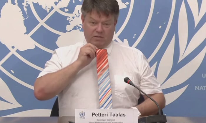 Taalas sports a climate change-inspired tie.
