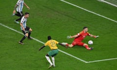 Argentina's goalkeeper #23 Emiliano Martinez saves a shot by Australia's forward #21 Garang Kuol during the Qatar 2022 World Cup round of 16 football match between Argentina and Australia at the Ahmad Bin Ali Stadium in Al-Rayyan, west of Doha on December 3, 2022. (Photo by Glyn KIRK / AFP)