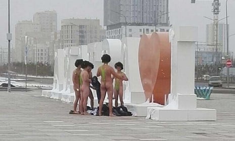 A group of Czech tourists dressed in swimsuits made famous by TV and film character Borat in Astana