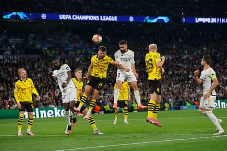 Real Madrid’s Dani Carvajal heads home the opening goal