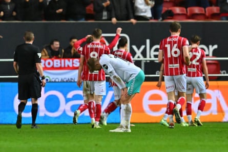 Southampton’s Stuart Armstrong looks dejected as Bristol City celebrate their third goal
