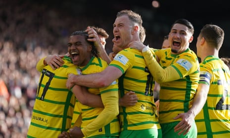 Norwich City players celebrate going 2-1 up against Plymouth Argyle.