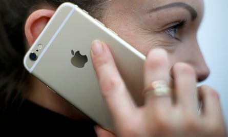 a woman on talking into an iPhone 6