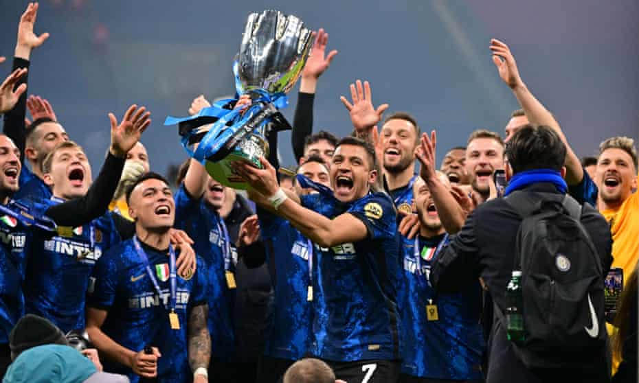 Alexis Sánchez and Inter teammates celebrate winning the Supercoppa.