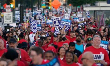 United Auto Workers members march through downtown Detroit in September 2023.