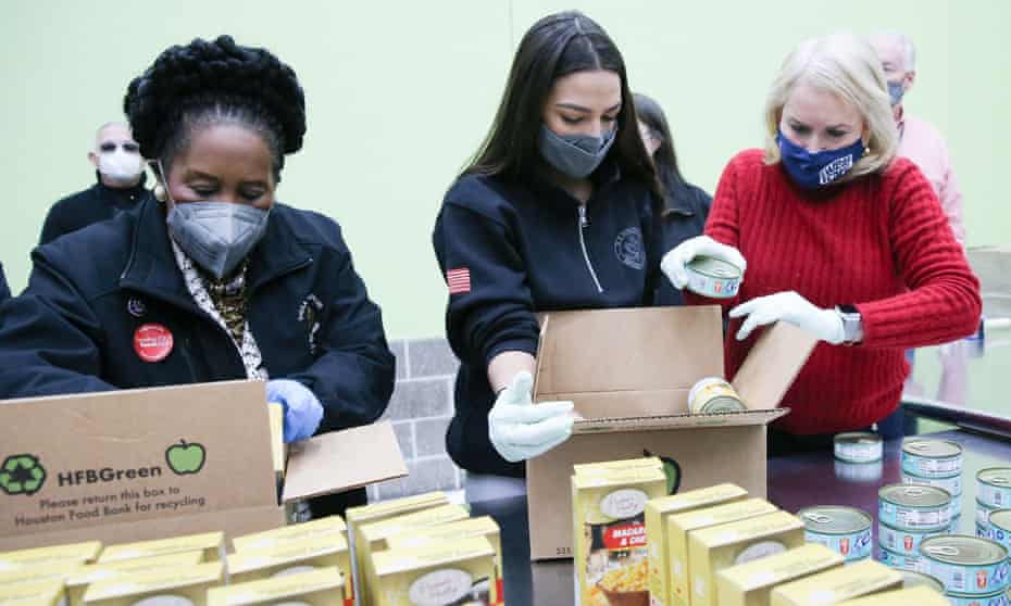 Democratic congresswomen Sheila Jackson Lee, Alexandria Ocasio-Cortez and Sylvia Garcia help hand out food at the Houston Food Bank.