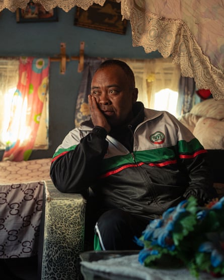 Tsiry Rakotomalala, the club’s coach, sitting in a darkened room looking fed up.