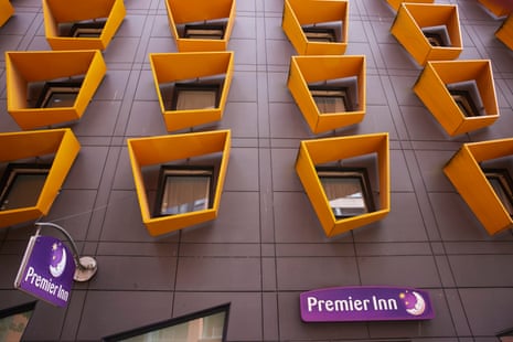 A Premier Inn hotel in Bury, Greater Manchester with colourful yellow and purple frontage.