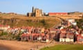 St Mary's Church and Whitby Abbey on East Cliff above Fishermen's cottages and Lower Harbour, Whitby, North Yorkshire, England, UK.<br>BR1NBN St Mary's Church and Whitby Abbey on East Cliff above Fishermen's cottages and Lower Harbour, Whitby, North Yorkshire, England, UK.