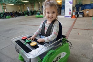A child in her mobility chair
