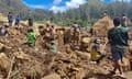 Locals digging at the site of a landslide at Yambali village in the region of Maip Mulitaka, in Papua New Guinea's Enga Province