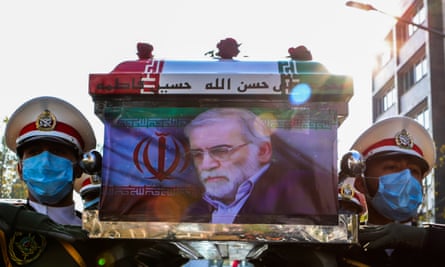 Soldiers carry the coffin of the Iranian nuclear scientist Mohsen Fakhrizadeh during his funeral in Tehran