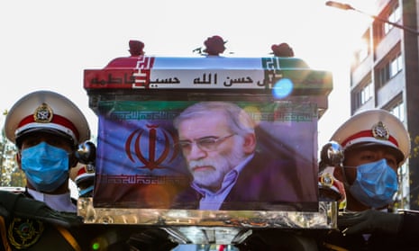 Soldiers carry the coffin of the Iranian nuclear scientist Mohsen Fakhrizadeh during his funeral in Tehran.