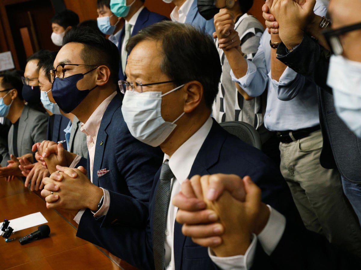 Hong Kong Opposition Lawmakers All Quit After Four Members Ousted Hong Kong The Guardian
