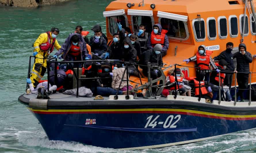 A group of people thought to be migrants are brought in to Dover, Kent, on board a lifeboat following a small boat incident in the Channel.