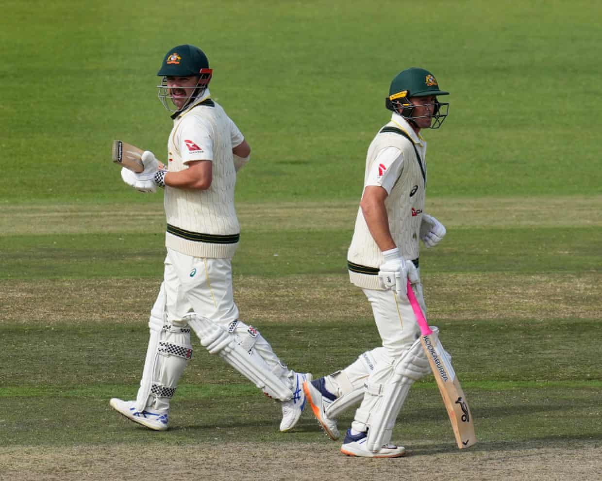 Australia batters Travis Head (left) and Marnus Labuschagne run between wickets in the second Test against South Africa