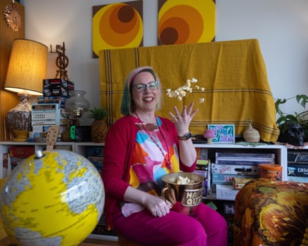 Quizzer Sally Gridley with her prize from ABC’s Hard Quiz, a golden bucket with the show’s logo on it