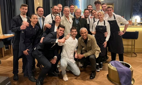 Former US president Barack Obama, Steven Spielberg and Bruce Springsteen pose for a picture with Amar restaurant staff in Barcelona