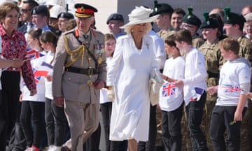 King Charles and Queen Camilla are welcomed by British cadets and French primary schoolchildren as they arrive for the UK national commemorative event in Normandy.