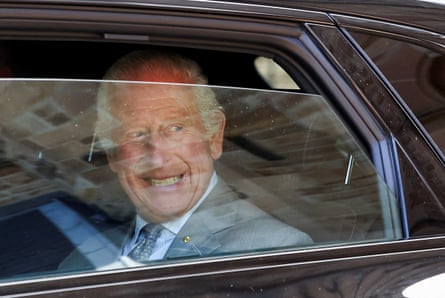 Charles in the back seat of a car