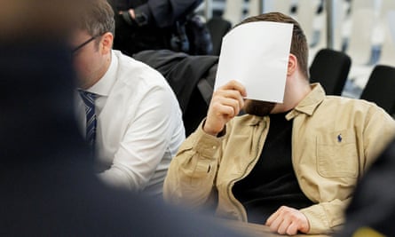 Rafih Remmo covered his face in court.