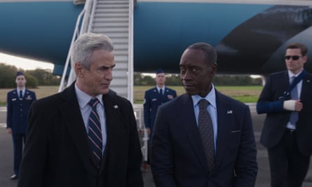 Dermot Mulroney, left, as President Ritson and Don Cheadle as James “Rhodey” Rhodes