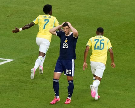 Scott McKenna reacts to Vinícius Júnior’s goal for Brazil against Scotland at the 2026 World Cup