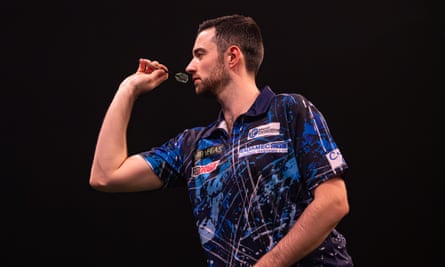 Luke Humphries throwing a dart during the Grand Slam of Darts final in Wolverhampton on 19 November 2023. 