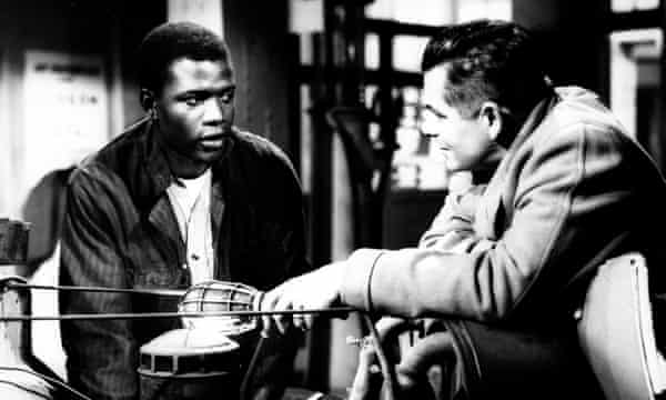 Poitier with Glenn Ford in 1955 teen hit Blackboard Jungle.