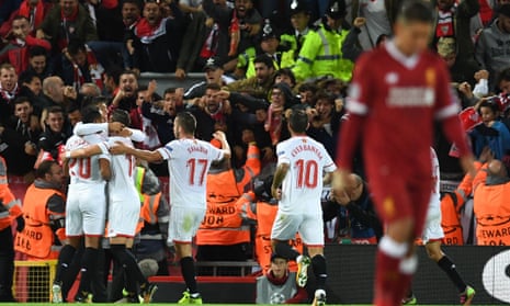 Sevilla’s Joaquin Correa celebrates with team-mates in front of the Spanish fans after scoring their equaliser.