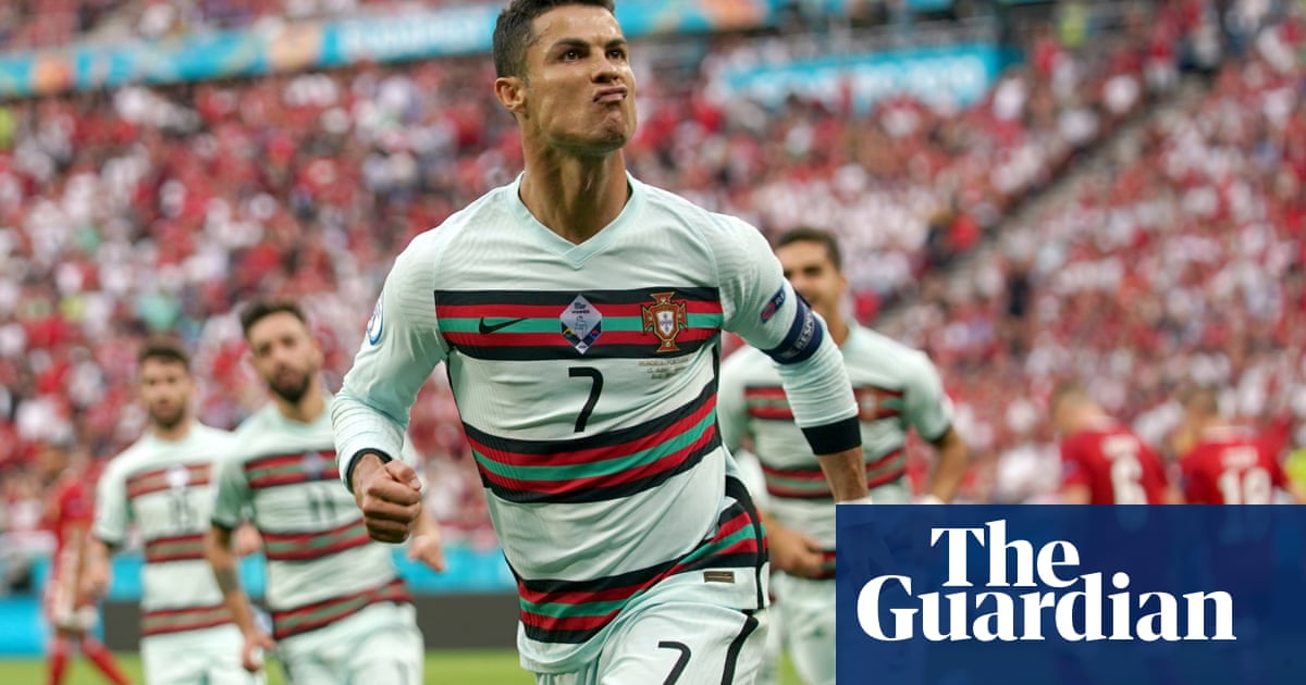 Cristiano Ronaldo’s historic double helps Portugal sink stubborn Hungary