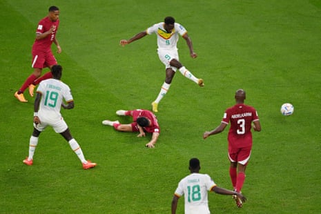 Slide scores for Senegal after some comical defending.