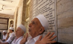 Parsi priests outside a fire temple in Gujarat, India.