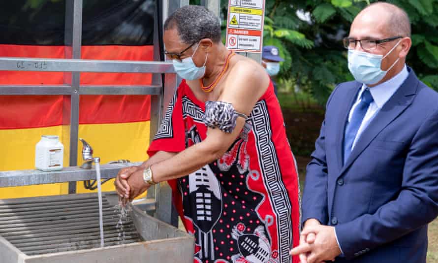 Acting prime minister Themba Masuku performs a ceremonial handwash to mark the completion of the Lobamba clinic