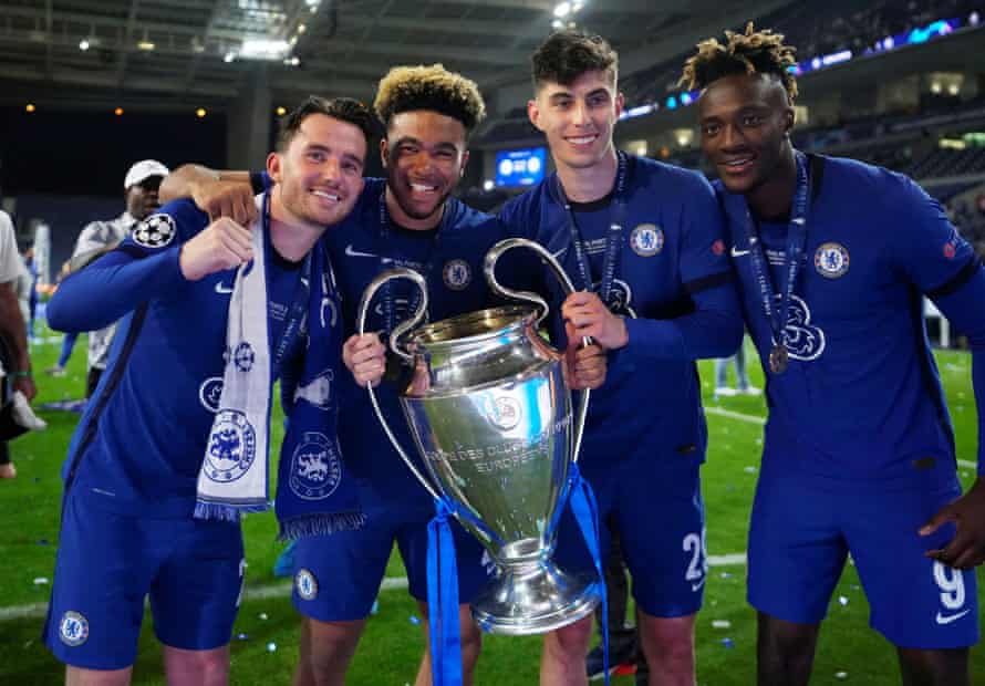 Chelsea’s Ben Chilwell, Reece James, Kai Havertz and Tammy Abraham celebrate with the Champions League trophy.
