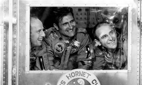 Richard Gordon, centre, with Pete Conrad, left, and Alan Bean in the quarantine capsule on board USS Hornet at the end of the Apollo 12 mission in 1969. 