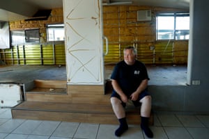 Robbie Taylor in his flood-affected holiday home at the Weerona holiday park at Manning Point.