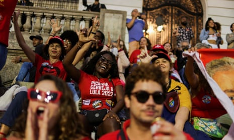 Supporters of Brazil's former President Luiz Inacio Lula da Silva react as they gather after polling stations were closed in the presidential election, in Rio de Janeiro, Brazil on 2 October 2022.