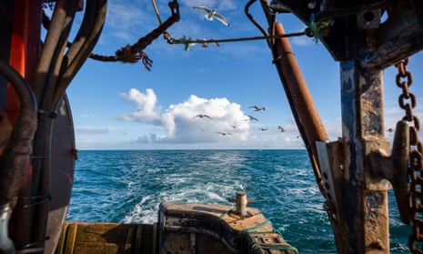 A view of the sea from the back of a fishing trawler.
