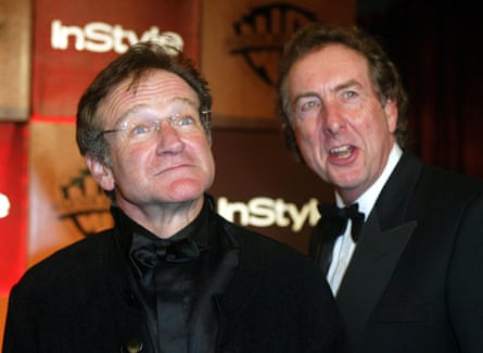 Idle with Robin Williams in 2004.