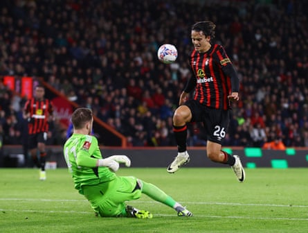 Leicester goalkeeper Jakub Stolarczyk comes out to block Bournemouth’s Enes Unal