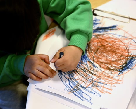 Child drawing in school