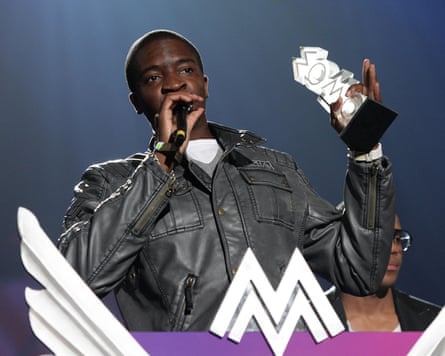 Guvna B collects his award for Best Gospel Act during the 2010 Mobo awards in Liverpool.