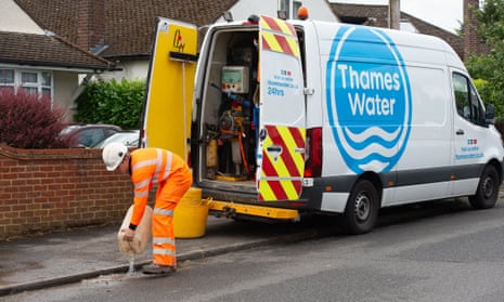 A photo of a Thames Water employee working in Windsor fixing leaking pipes in July 2023.