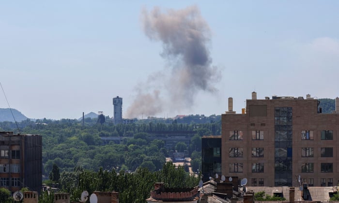 Smoke rises over the city following recent shelling in Donetsk.