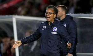 Brighton coach Hope Powell remonstrates from the bench.