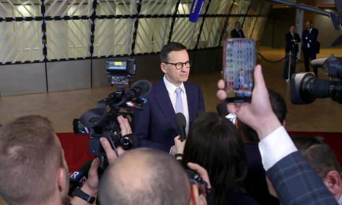 Polish Prime Minister Mateusz Morawiecki talks to the media as he arrives at the second day of a EU Summit in Brussels, Belgium, 24 June 2022.