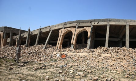The severely damaged tomb of the late Iraqi dictator, Saddam Hussein, in the village of al-Awja, on the outskirts of Tikrit.