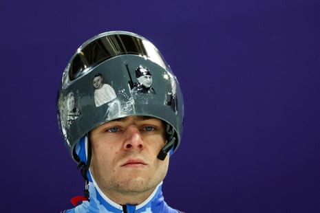 Ukraine’s Vladyslav Heraskevych wears a helmet with pictures of Ukrainian victims of his country’s war with Russia.